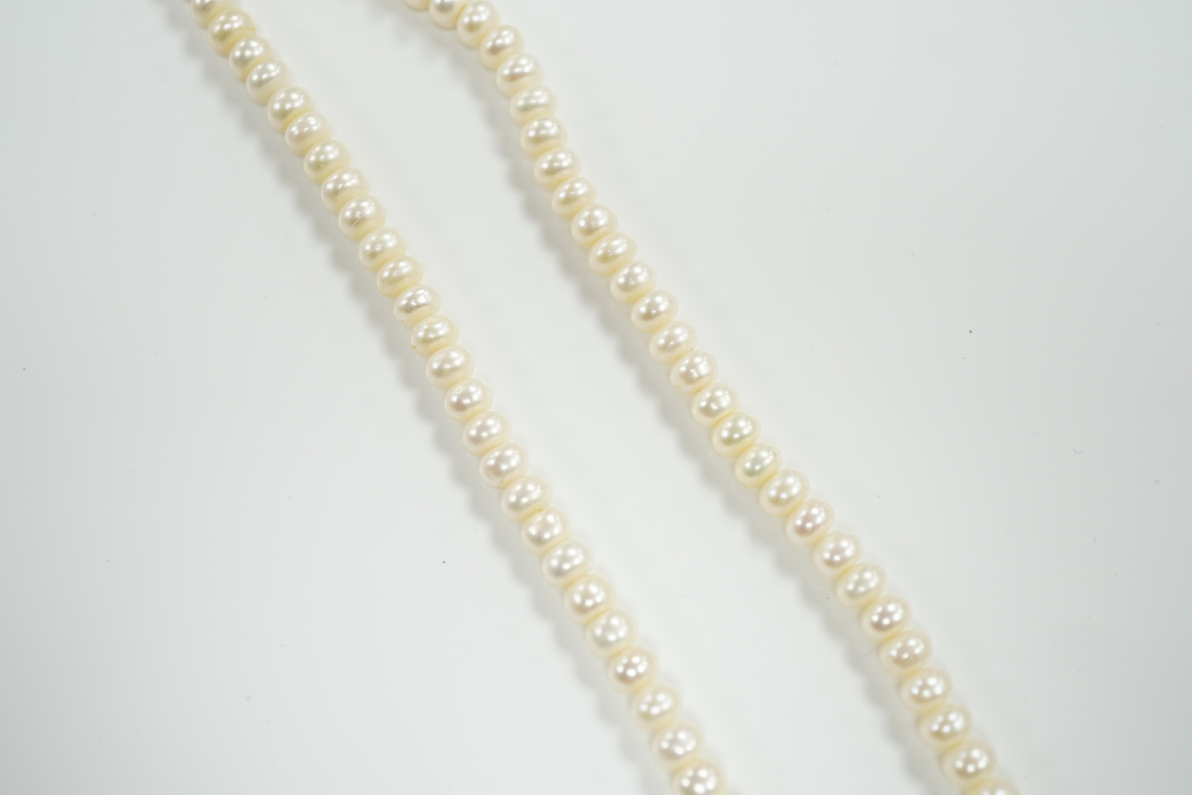 A single strand cultured pearl necklace, with 9ct clasp, 46cm.